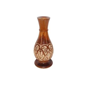 carved traditional vase with brown design